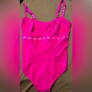 Spotlight Shaping Demi Cup Thong Bodysuit. Color:shimmered boo star pink Size 1X
